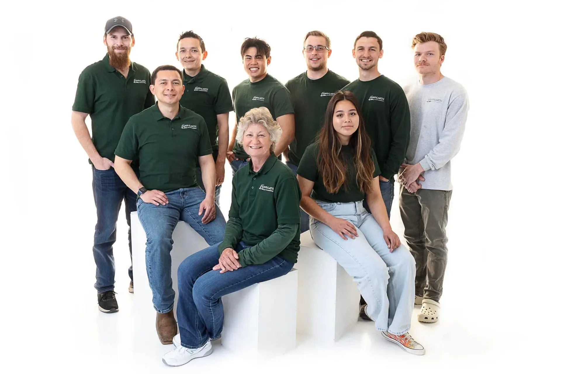 The Good Earth Water Gardens team in green company polos
